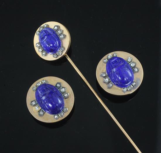 A late 19th/early 20th century French 18ct gold, lapis lazuli and rose cut diamond scarab cravat pin and pair of buttons